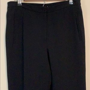 Black pleated dress pants. In new condition